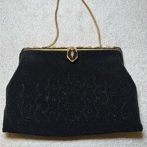 Elegant Black Beaded Clutch with Gold Trim